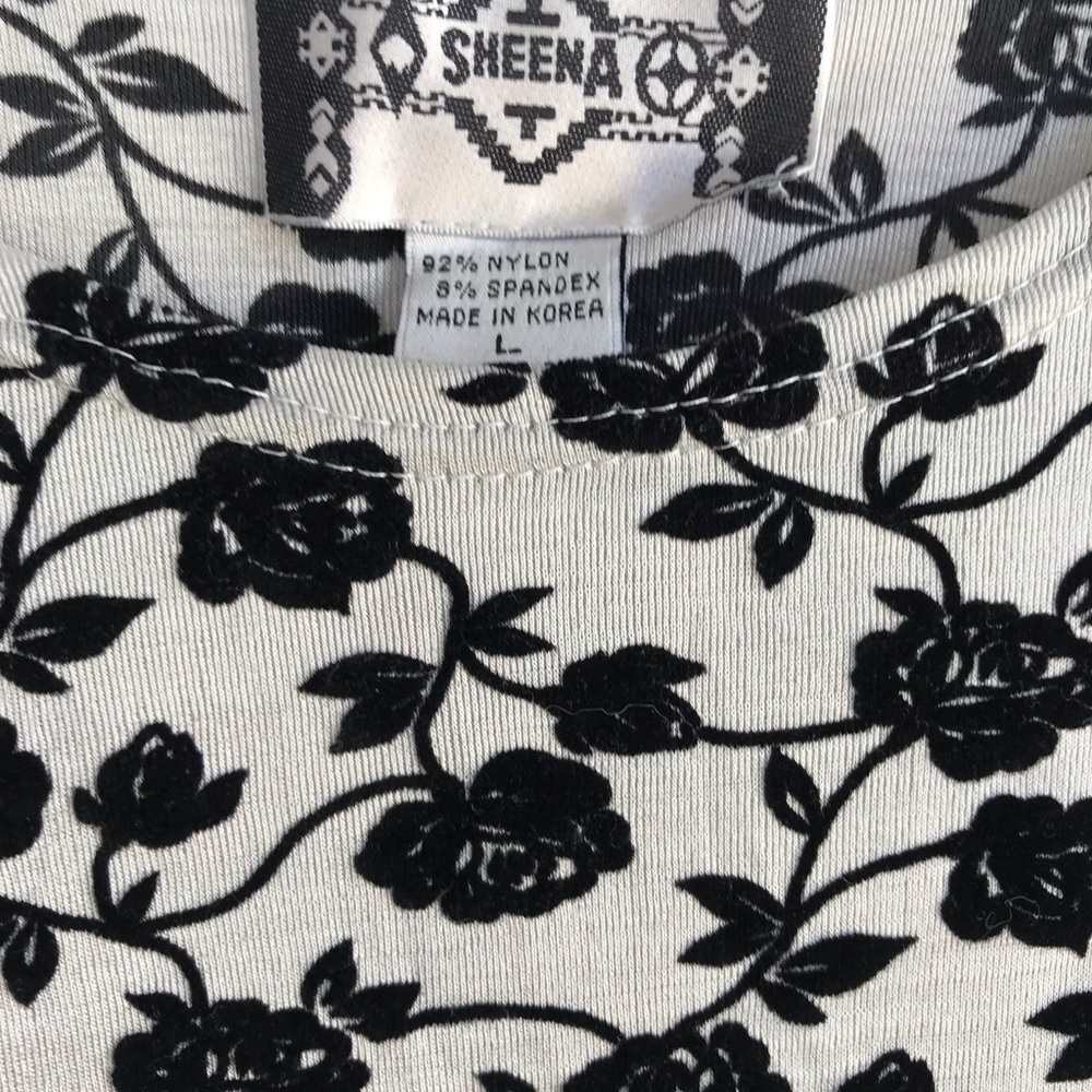 LARGE, long sleeved, stretch, top with flowers